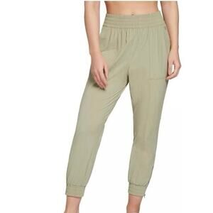 CALIA by Carrie Underwood Women's Nyluxe Woven Jogger pants in green size medium